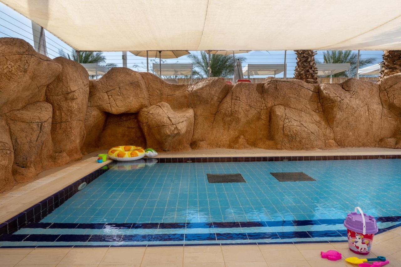 Vert Hotel Eilat By Afi Hotels Екстериор снимка The swimming pool at the Dead Sea Spa Magdala